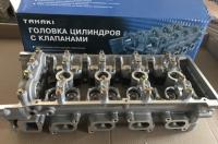 Головка блока цилиндров ГАЗ дв.405 в сборе 5-опорная без валов (TANAKI) (прокладка, шпильки)